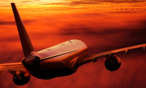 Jet Above Red Sky Flugreisen können ebenfalls Stress bedeuten © Reinhold Föger - Fotolia.com